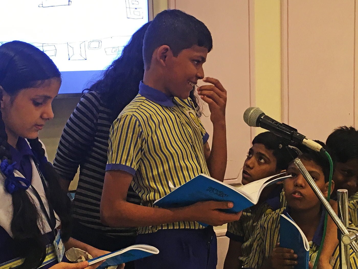Gayasuddin reads out his comic at the Saturday Co-mix launch 